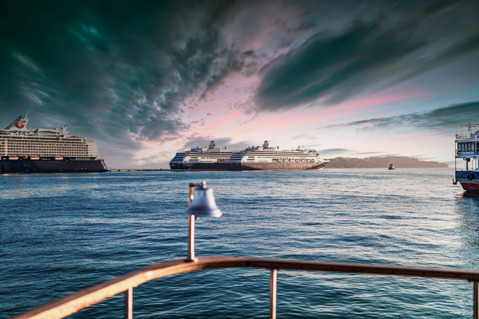 Huge cruise ships sail under dark stormy clouds at sunset Cruise Ship Injuries